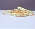 Hand-painted enamel beige floral bangle