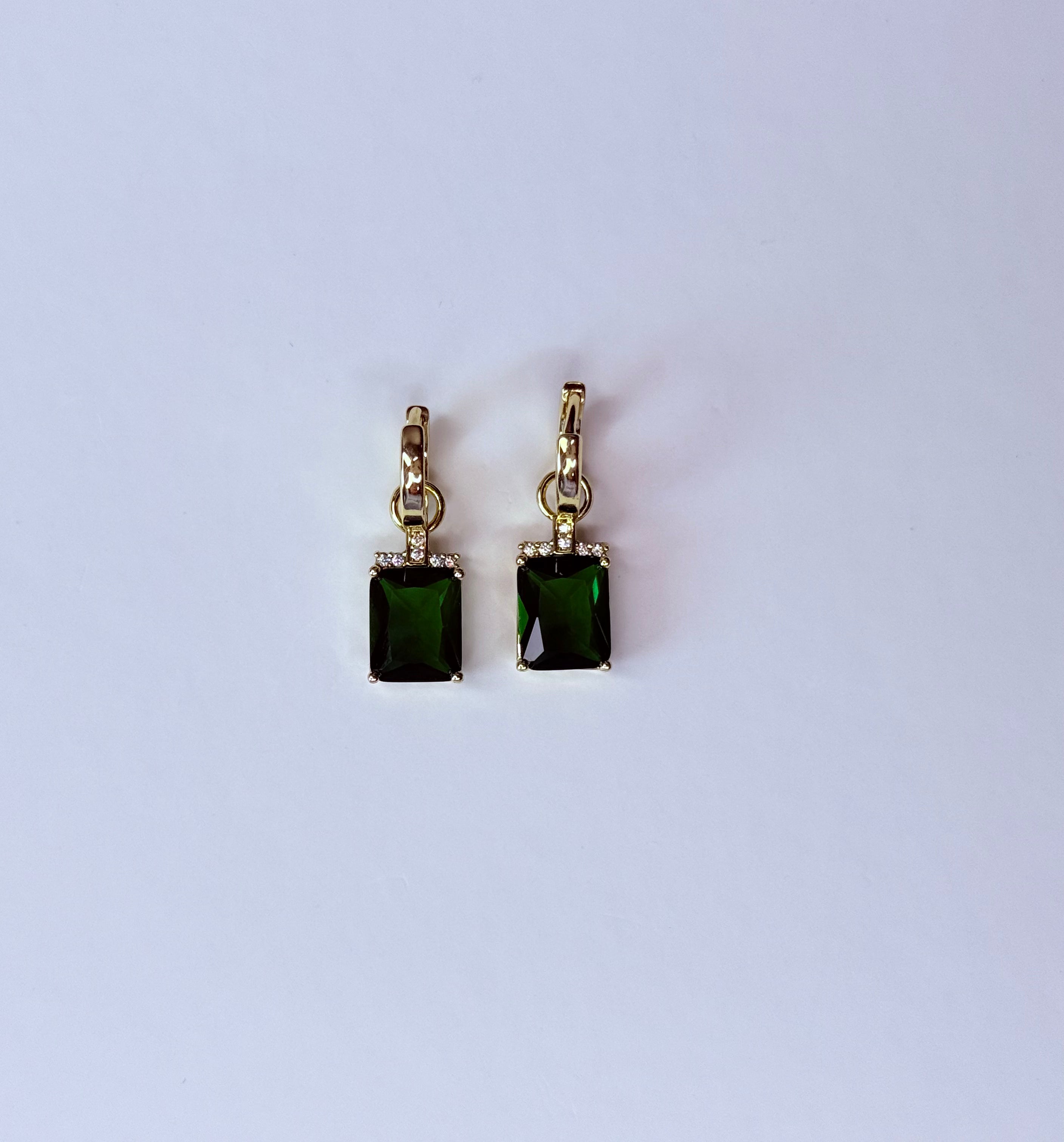 Green crystal earrings.
