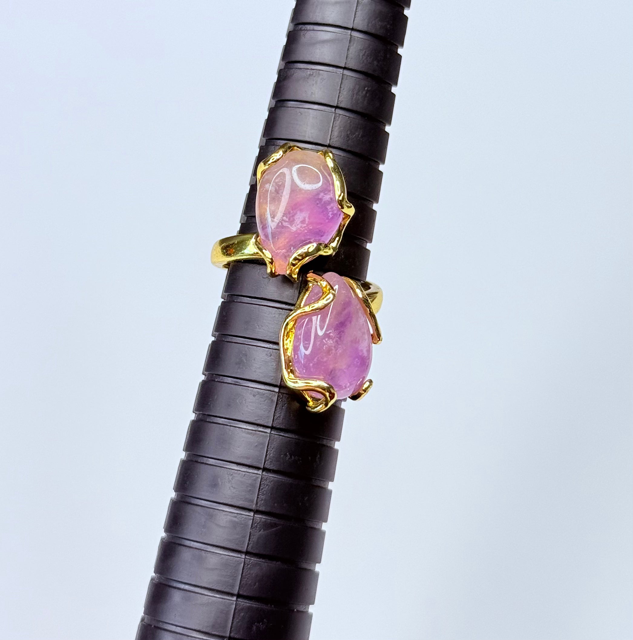 Adjustable amethyst ring.
