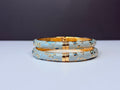 Hand-painted enamel baby blue floral bangle