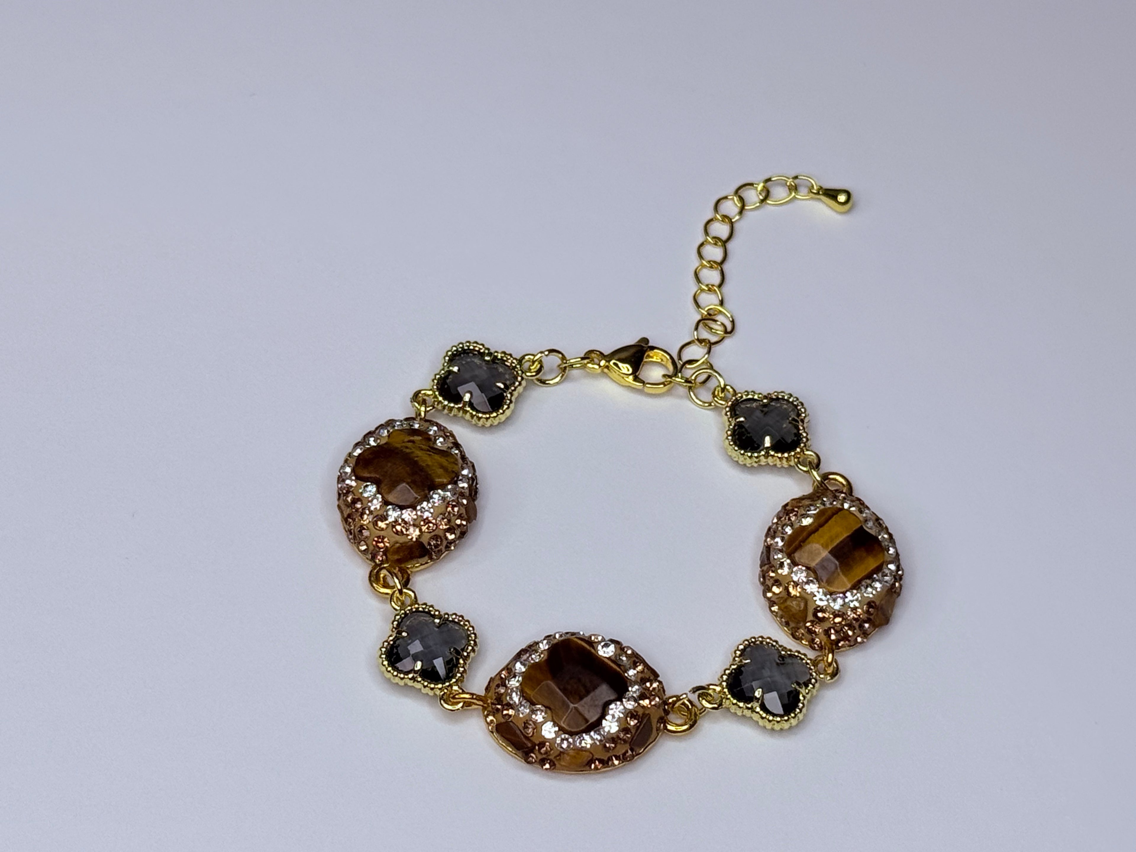 Special floral bracelet with solid crystals and genuine natural stones tiger’s eyes.