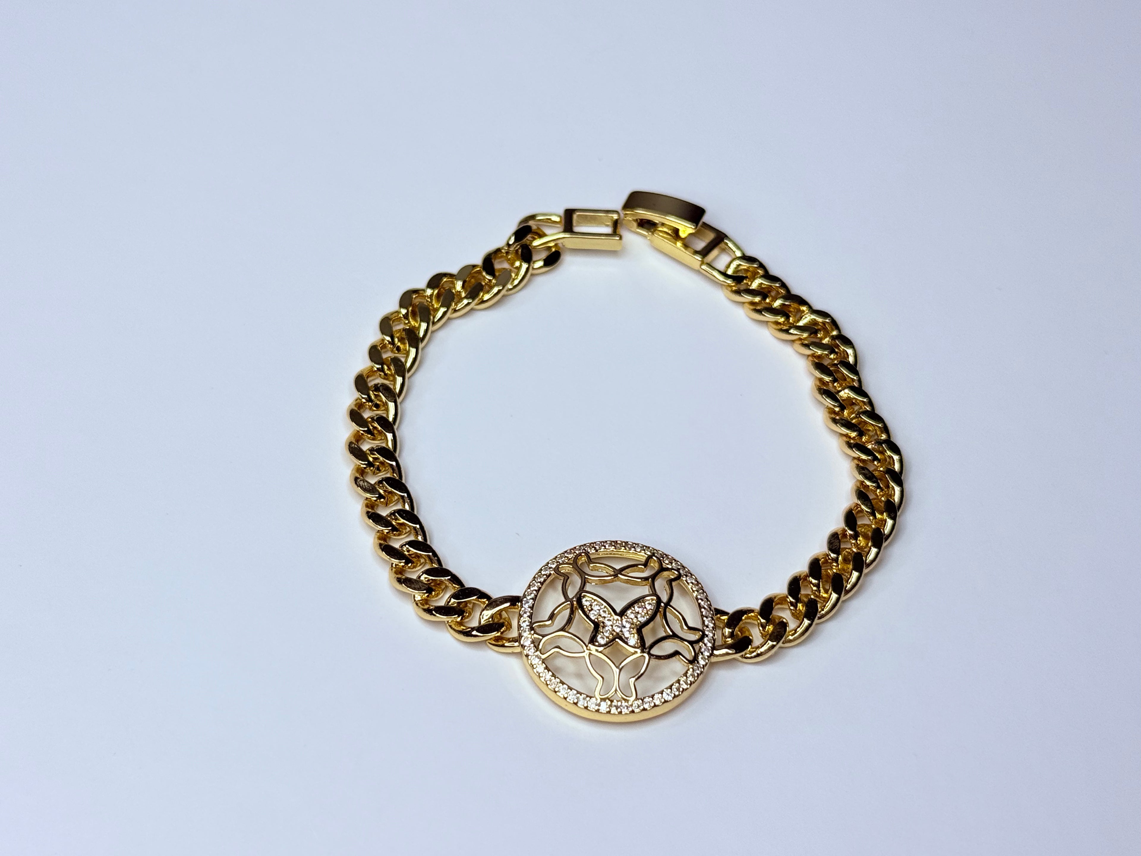 Cuban-style bracelet with butterflies.