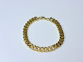 Cuban link bracelet with cubic zirconia.
