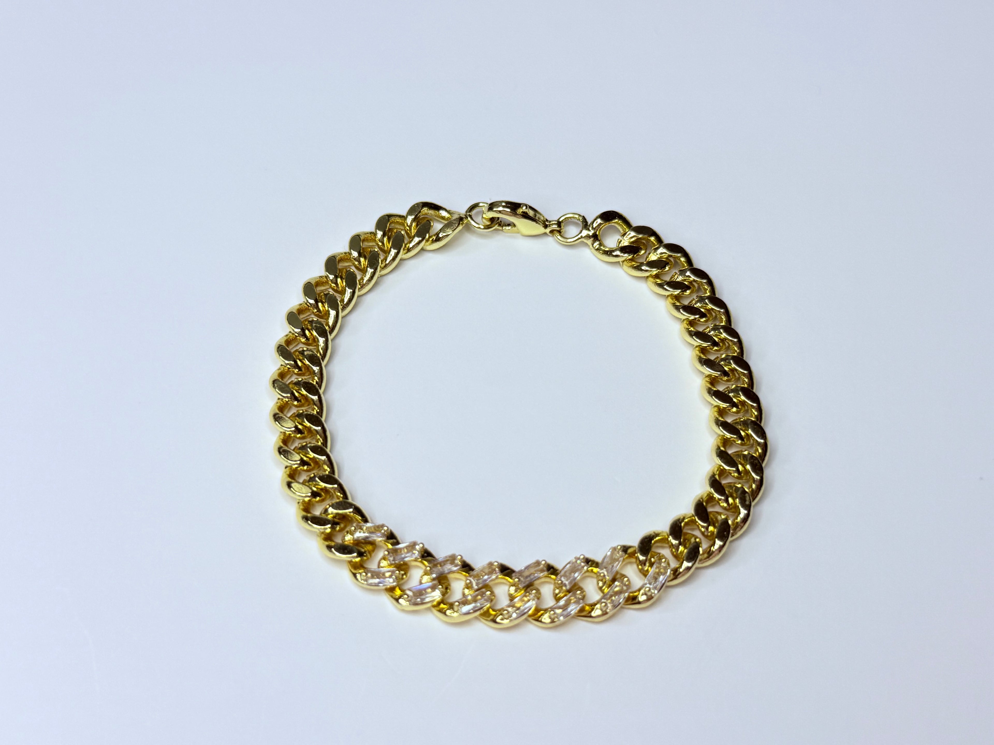 Cuban link bracelet with cubic zirconia.