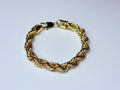 Gold twisted-style bracelet.