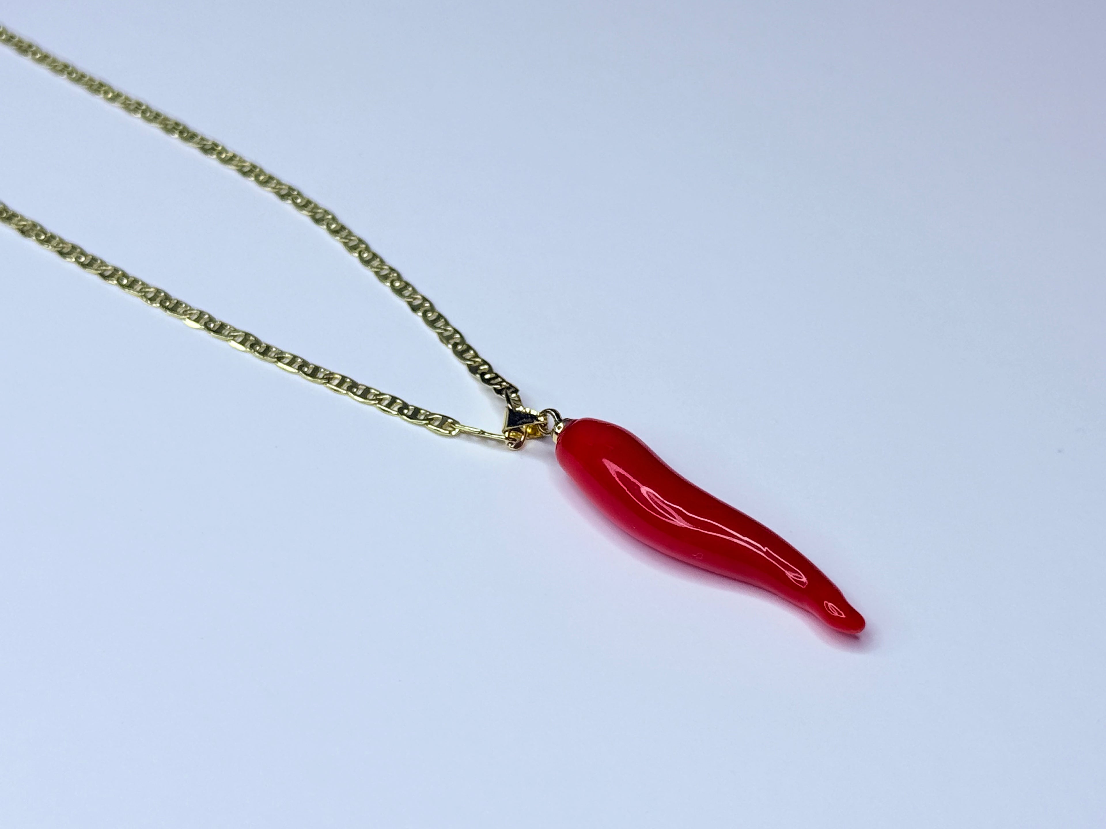 Red chili pepper necklace.
