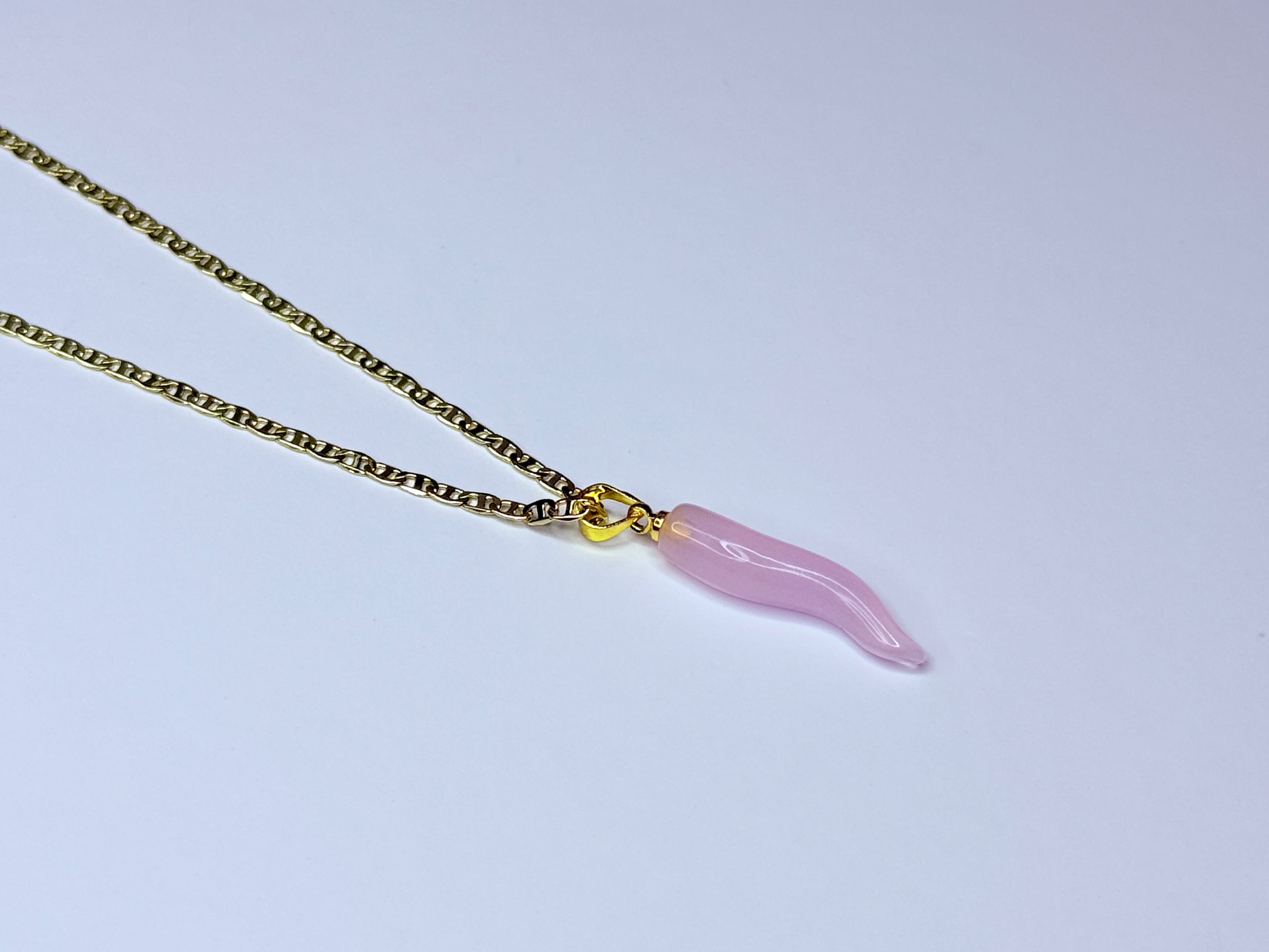 Pink chili pepper necklace.