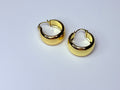 Chunky gold earrings.