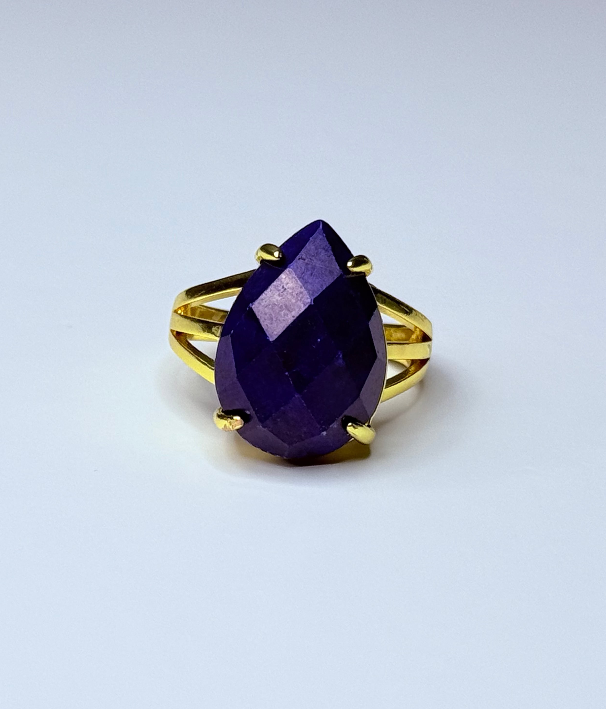 Adjustable lapis lazuli ring.