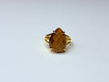 Adjustable tiger's eye ring.