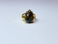 Adjustable moss agate ring.