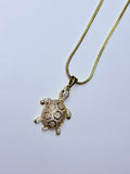 Turtle necklace.