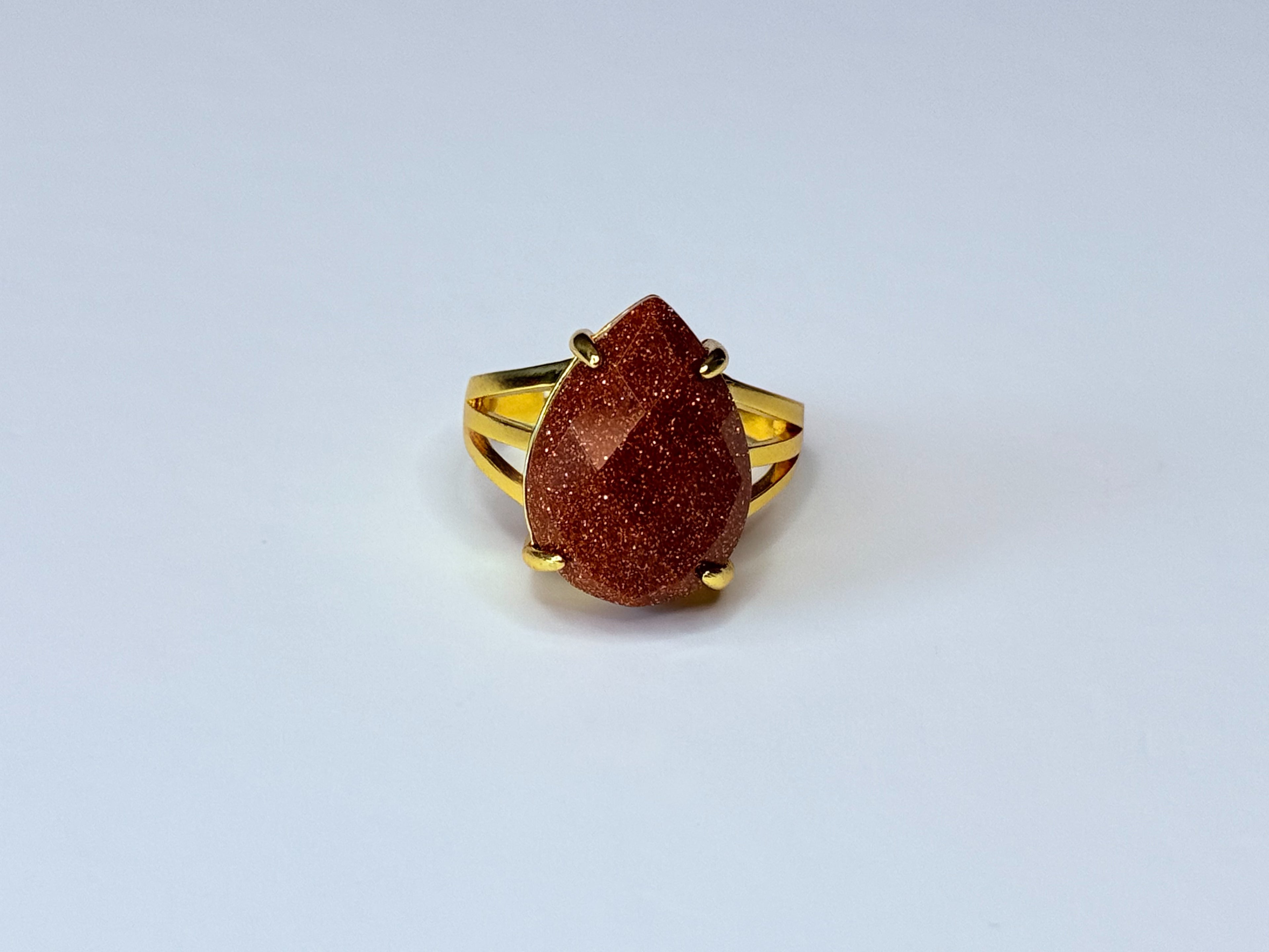 Adjustable aventurine stone ring.