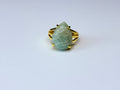Mint green adjustable ring.