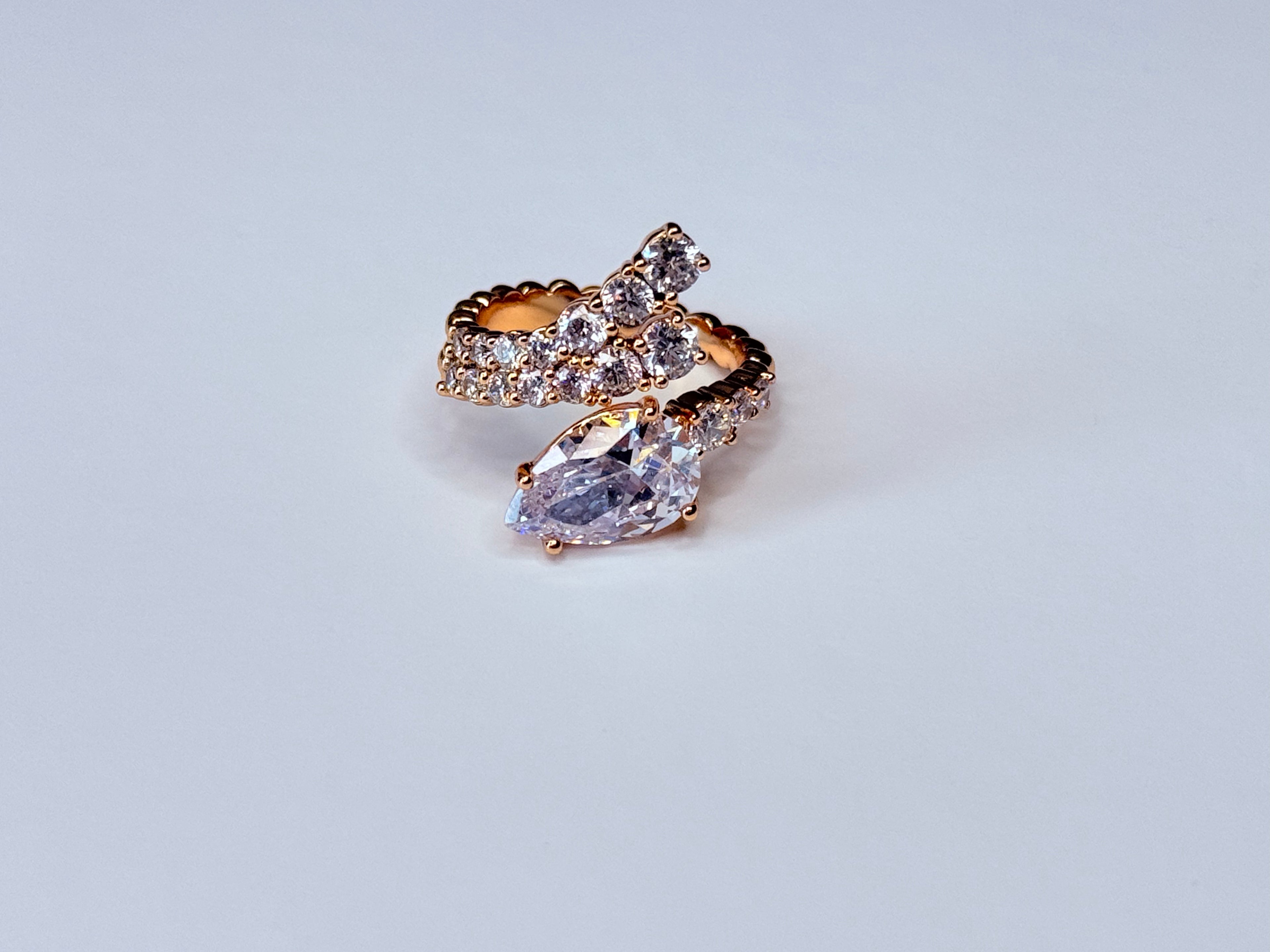 Adjustable rose gold ring.