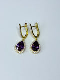 Violet crystal earrings.