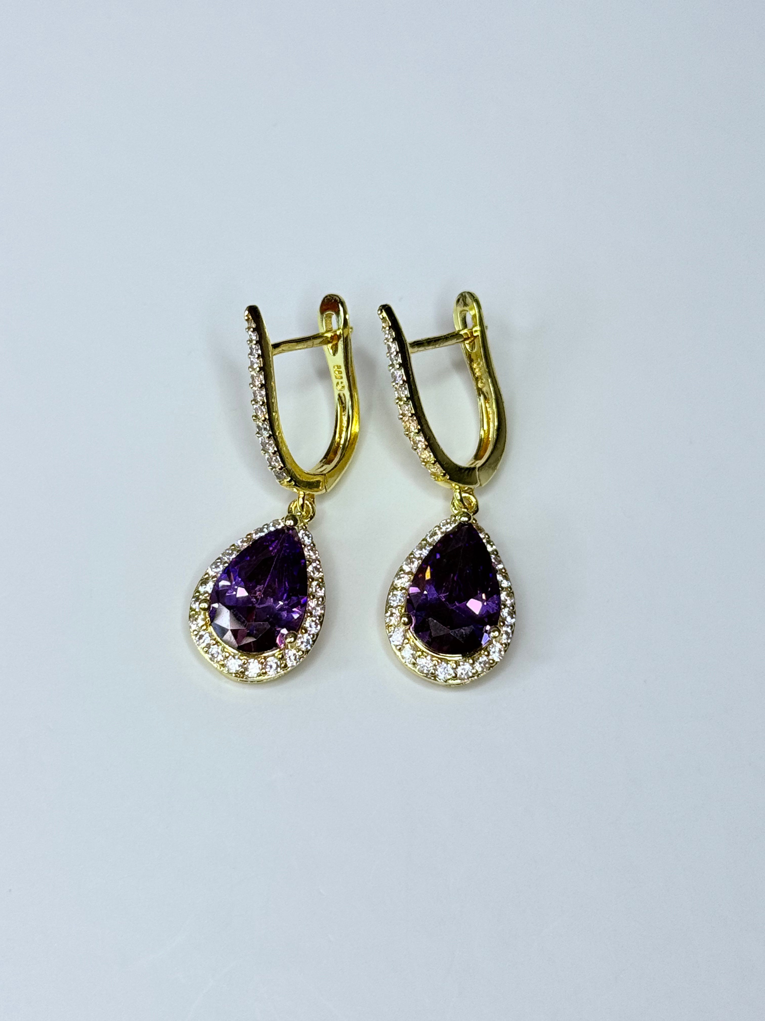 Violet crystal earrings.