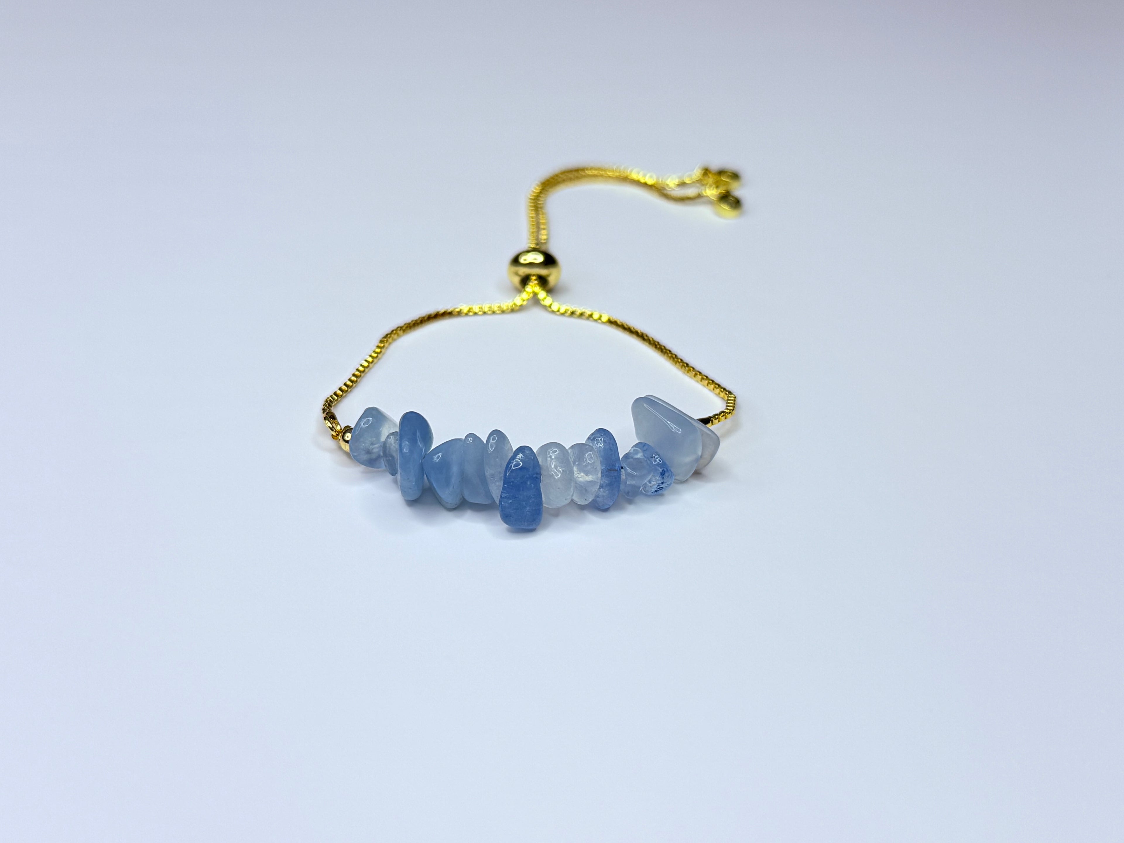Adjustable genuine stone aquamarine bracelet.