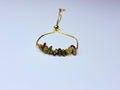 Adjustable genuine stone unakite bracelet.