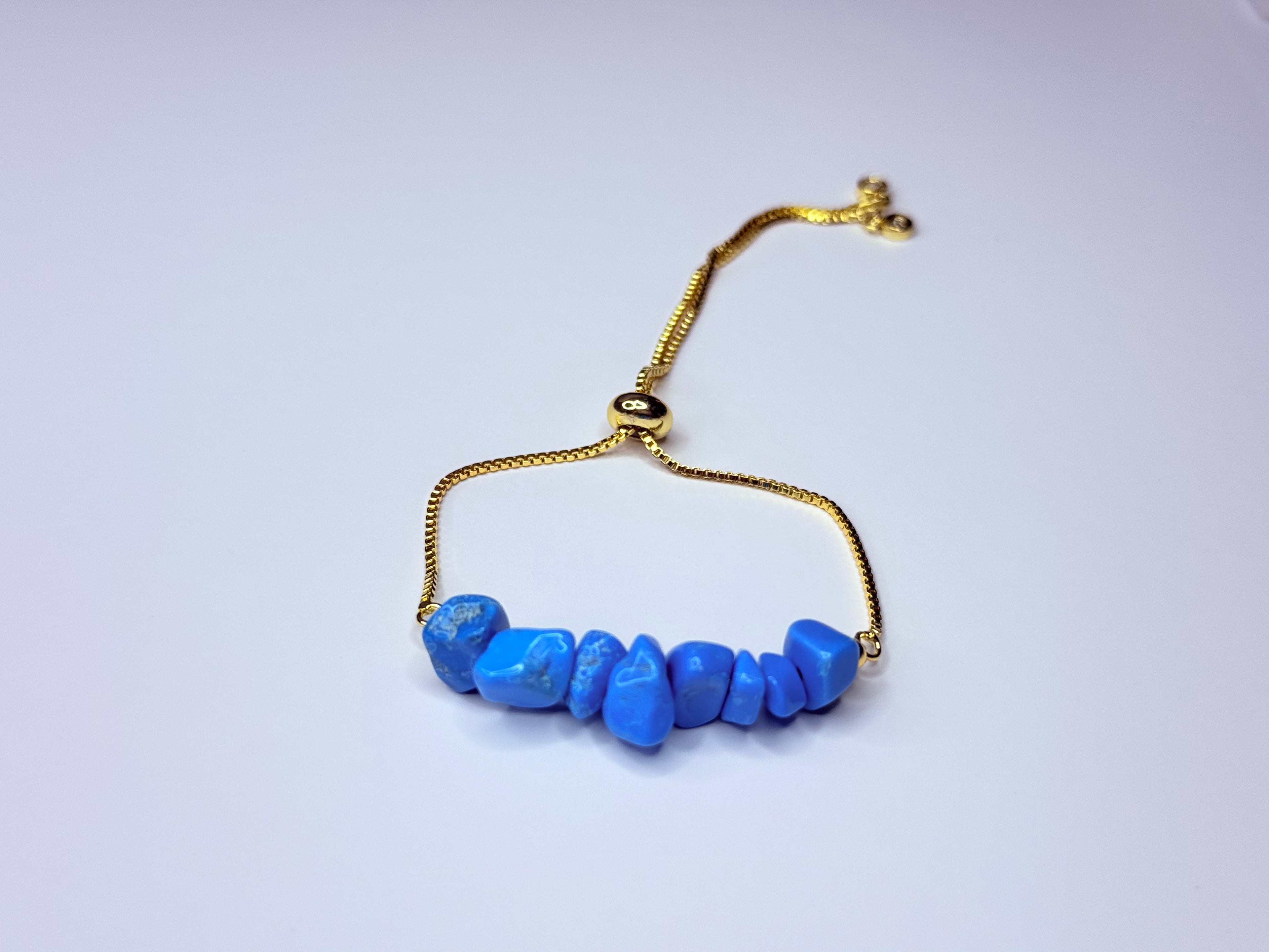Adjustable genuine stone turquoise bracelet.