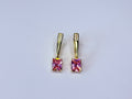 Pink crystal earrings.
