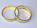 Chunky gold bangles.