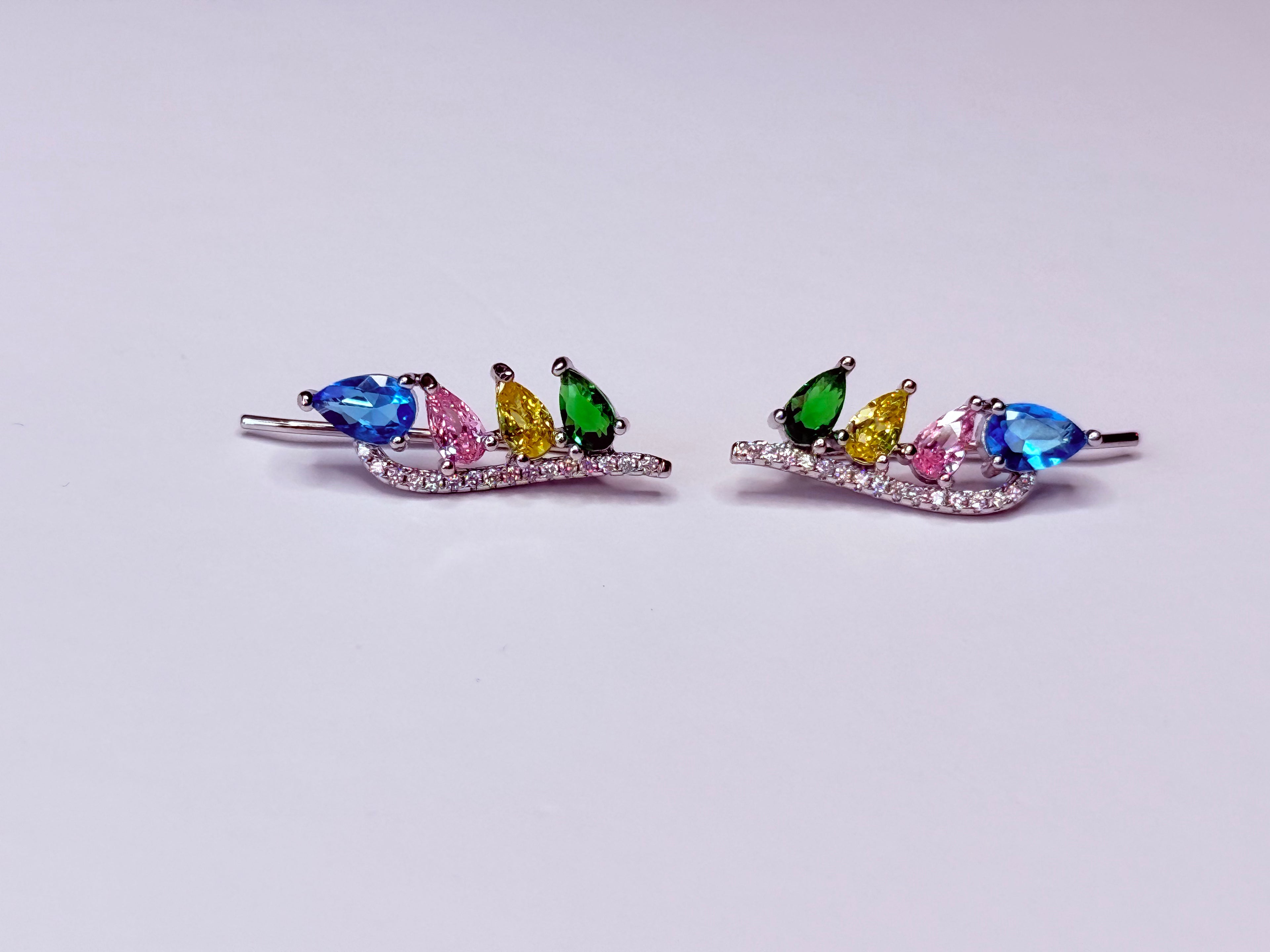 Multicolor silver-tone earring.