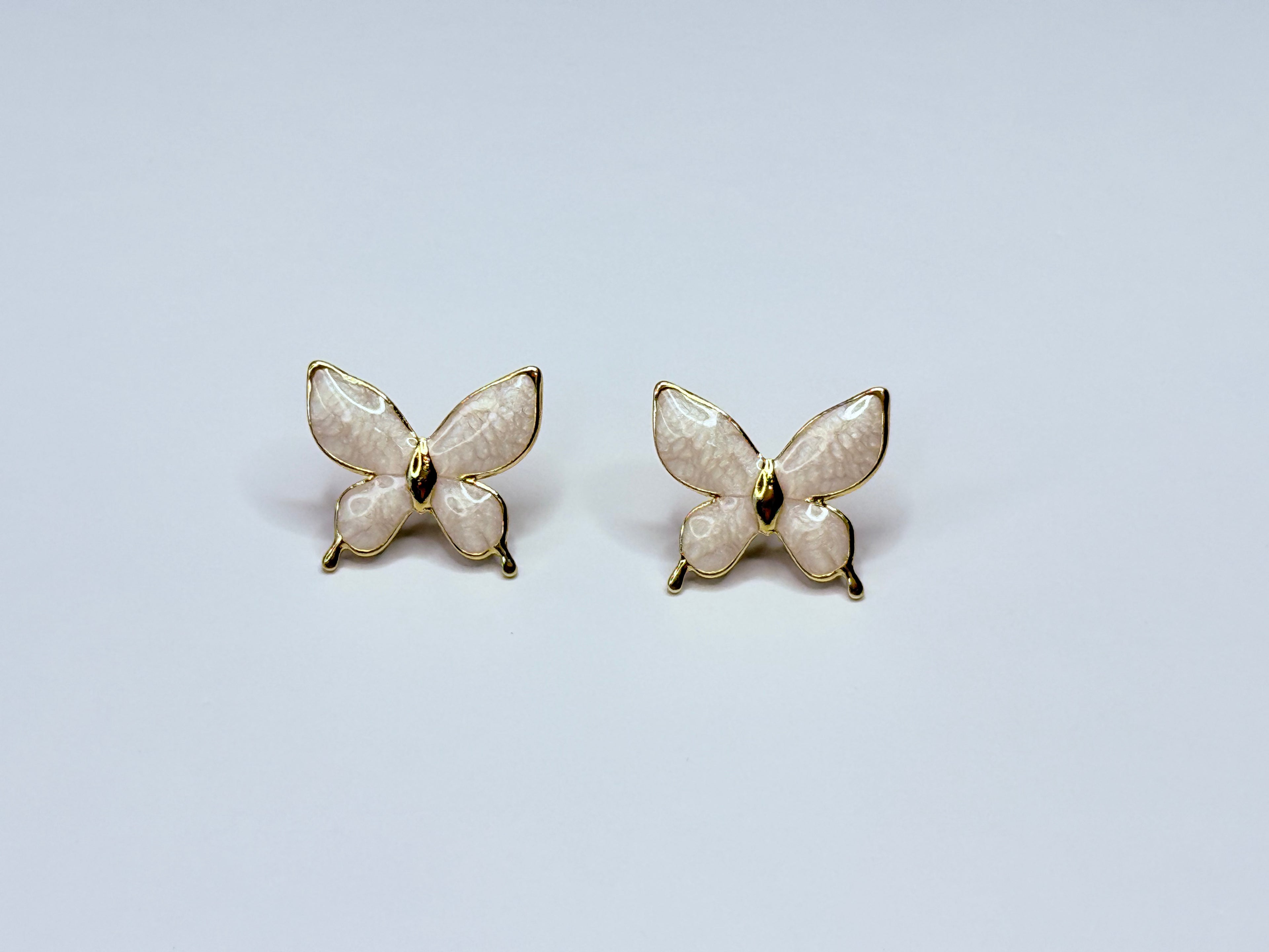 Butterfly earrings.