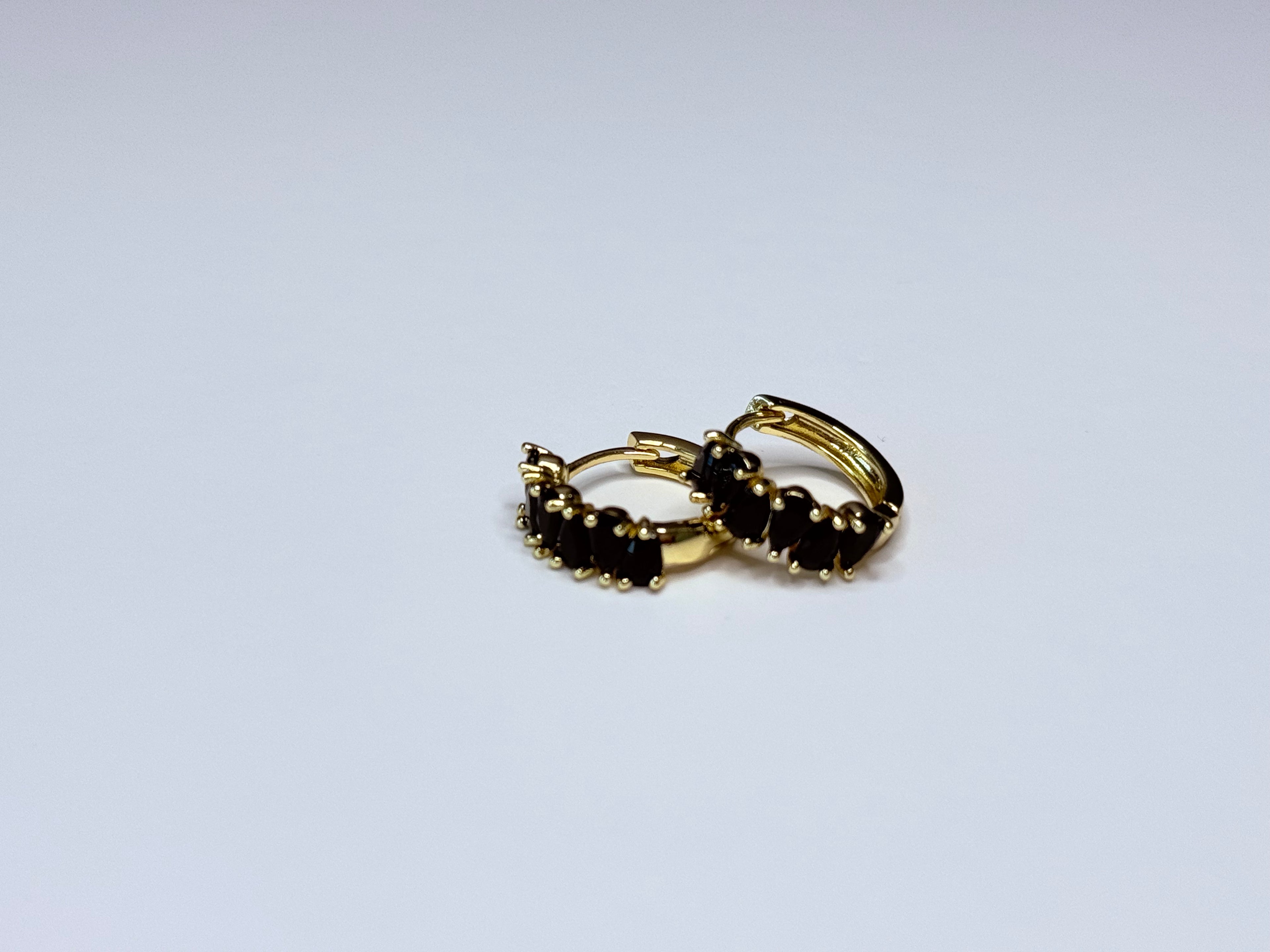Earrings with Blue cubic zirconia.